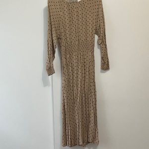 Women’s polka dot midi dress with smocked waist and cuffs
